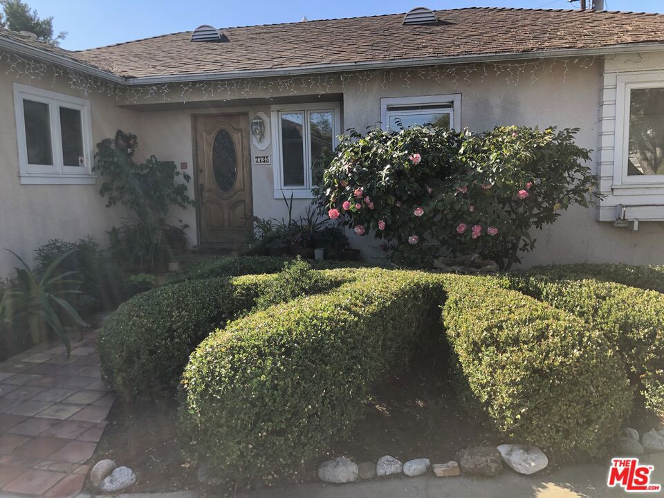 This lovely neighborhood home was built in the 1950's. With 3 bedrooms and 2 baths, it is located in one of the most desirable areas of Westchester. It offers approx. 1,365 sq. feet of living space, which includes one master bedroom and two smaller bedrooms for children, guests, or a home office. The full remodeled bathroom includes quartz counters with a tub and a beautiful spacious shower. The large remodeled kitchen features quartz counters with an updated spacious area and a large central breakfast island. Hardwood floors are prominent throughout the home. While relaxing in the living room with the gas fireplace on, you will have a lovely view of the backyard pool. Enter the backyard and you will find a beautiful garden of varietal plants surrounding a large swimming pool. There are plenty of shaded, as well as sunny areas in and around the pool. The large front yard offers a peaceful garden area with plenty of space that can be converted for other outdoor uses. A long driveway leading up to the two car garage, has room for multiple cars. This property has great potential with significant space for rebuilding, expanding, remodeling, or simply enjoying the lovely features of the home as it is today. Come and see how conveniently located this property is to Cowan Elementary School, LAX, restaurants, shopping, DTLA, and local beaches. Builders and Developers should also check out this opportunity.