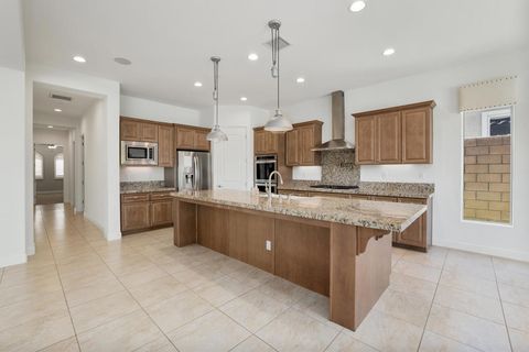 Photo of 74114 Cosmopolitan Lane, Palm Desert, CA 92211 (MLS # 219146530DA)