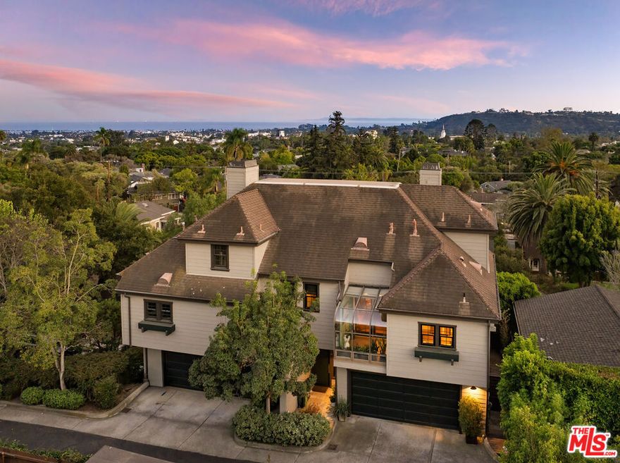 Historic charm and modern ease meet at this 2BD/2.5BA Craftsman-style townhome, moments from the Mission and Rose Garden. A dynamic flow unfolds from the split-level design, where vaulted ceilings, natural light, & ocean-views are the backdrop to daily life. The spacious living room extends to a sun-drenched patio and just half a level up features an updated kitchen, formal dining room, and versatile office/den. The upper level is devoted to the primary suite w dual walk-in closets, a fireplace, spacious bath, and private deck with sweeping ocean & island views, while the lower level provides a private guest suite & patio. Embrace the rhythm & refinement of SB with this Upper East gem!
