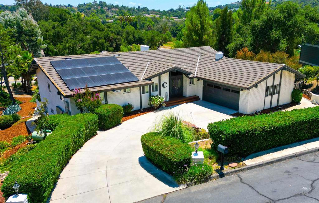 Welcome to this stunning Upgraded 2 Story Home in Hidden Meadows! Enjoy top of the hill views of beautiful mountains. Welcome to your dream home! This beautifully upgraded 4-bedroom, 3 1/2 bathrooms gem offers 2,400 sq. ft. of refined living space, nestled in the desirable Hidden Meadows Community Fully updated kitchen with modern finishes and high-end appliances. Upgraded bathrooms with designer touches throughout. Freshly painted interior. Basement retreat featuring a spacious living room, gym, with 1 bedroom and full bathroom with a Bar and Wine Rack. Step outside to your private oasis, featuring: A brand-new custom patio. Built-in BBQ and Wood-Fired Pizza Oven. Relaxing Jacuzzi and Cold Plunge. Professionally designed and landscaping perfect for entertaining. This home blends luxury, comfort, and incredible value. Don't miss the opportunity to live in one of the most peaceful and sought after areas of Hidden Meadows! Home is Beautifully Landscaped with 9 Fruit Trees in the backyard.