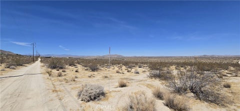 Photo of 64200 Cottonwood Drive, Joshua Tree, CA 92252 (MLS # DW26164981)