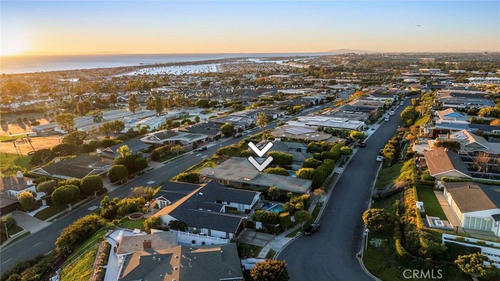 Photo of 2921 Setting Sun Dr, Corona Del Mar, CA 92625 (MLS # NP26083259)