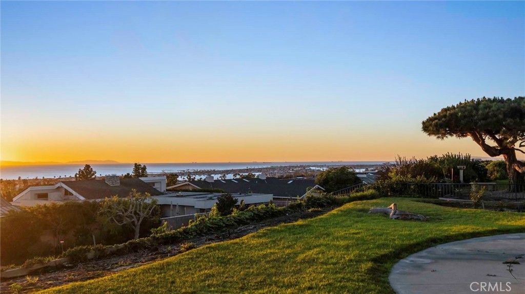 Photo of 2921 Setting Sun Dr, Corona Del Mar, CA 92625 (MLS # NP26083259)