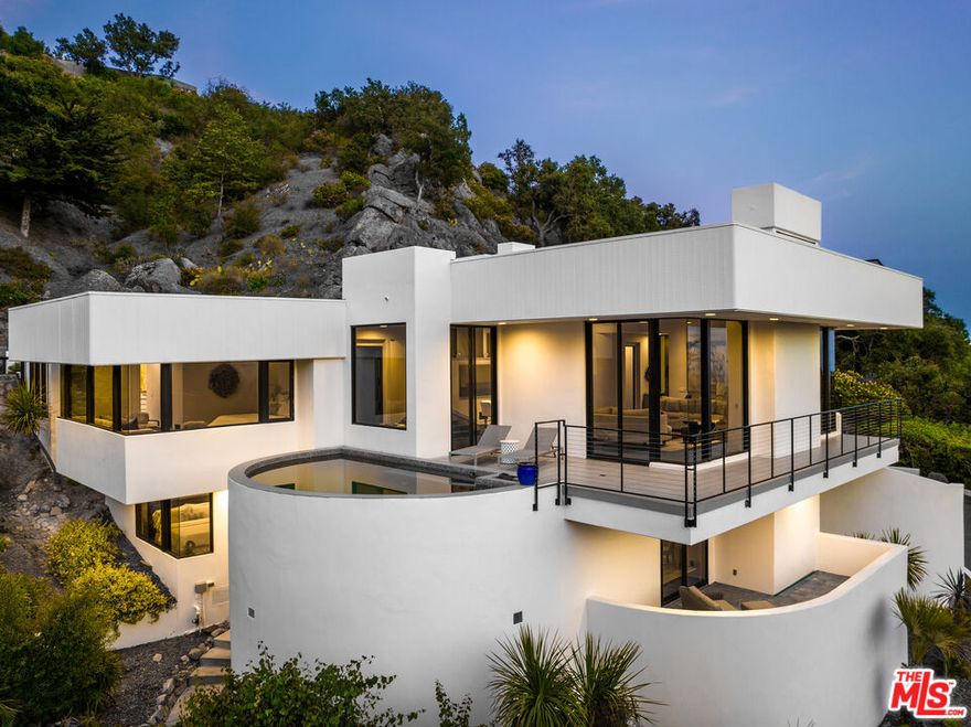 Welcome to your modern oasis of elegance in Montecito's prestigious Park Lane West. This 5-bedroom residence offers stunning ocean and mountain views and a serene connection with nature, providing the perfect retreat for a luxurious escape. Recently revitalized with extensive renovations, this home exudes contemporary sophistication and meticulous attention to detail. Step inside, and you'll immediately be greeted by the allure of the expansive walls of glass that frame picturesque vistas, the soaring ceilings that create an open and airy ambiance, and the warmth of natural light that fills every corner, bringing the outdoors in.The primary suite boasts a marble-clad bathroom with a relaxing whirlpool tub, offering a tranquil space to unwind while taking in the mesmerizing mountain views. The Chef's kitchen is a culinary dream, equipped with top-of-the-line Wolf and Miele appliances, custom cabinetry, wet bar and ample pantry storage. Multiple indoor and outdoor gathering areas make entertaining a breeze, allowing you to make the most of Montecito's wonderful climate.Outside, discover three professionally landscaped acres, highlighted by a tranquil plunge pool, perfect for unwinding amidst the captivating beauty of nature. This contemporary Montecito retreat offers the perfect balance of modern sophistication and the serenity of the great outdoors. Experience the finest in Montecito living in this extraordinary home.