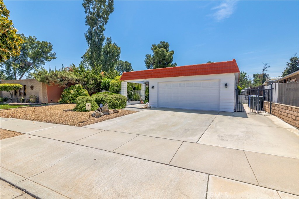 First time on the market in over 20 years! This well-loved home is right on the golf course in the fantastic 55+ Seven Hills community, with incredibly low HOA dues—approx $48 a year! The main home features 2 bedrooms and 2 bathrooms, plus spacious living and dining areas, perfect for both relaxing and entertaining. There’s a built-in wet bar for hosting, and a bright, open feel throughout. Step into the massive enclosed front porch with floor-to-ceiling windows that let in tons of natural light and offer panoramic views of the golf course—a true showstopper! The large backyard gives you plenty of outdoor space to enjoy the peaceful surroundings. Need room for guests or hobbies? The separate casita offers its own bedroom and bathroom—perfect for visitors, an office, or studio. A 2-car garage rounds out this fantastic property with lots of storage. This is a rare opportunity in one of the area's most popular senior communities—don’t miss it!