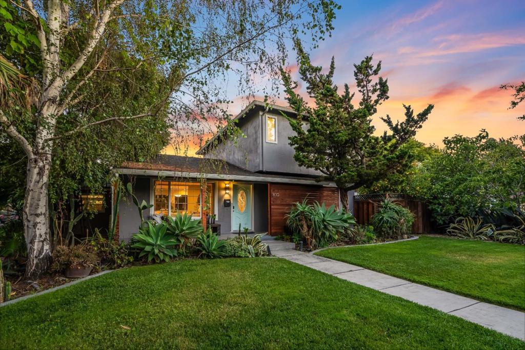 Welcome to a beautifully reimagined retreat in the coveted Rose Garden/Cory neighborhood. Where modern comfort meets the soul of California living. Set on a rare 9,000+ SF corner lot with over 2,600+ SF of thoughtfully designed space, this home was crafted for connection, relaxation, and style. Step into a sunlit open floor plan anchored by a dramatic great room with vaulted ceilings, exposed beams, skylights, and a cozy fireplace. Flowing seamlessly to a backyard that feels like your own private resort. Lounge by the shimmering pool, unwind in the jetted spa, or entertain beneath the palms as music drifts through the evening air. The chefs kitchen dazzles with quartz counters, a large island, sleek cabinetry, skylight, and premium Samsung, Bosch, and Magic Chef appliances. Designer baths, hardwood floors, solar panels, central AC, and a dedicated laundry room with storage complete the picture. Just moments from the historic Rose Garden, The Alameda, Santana Row, Valley Fair and Santa Clara. This is easy, elegant, everyday living at its finest.