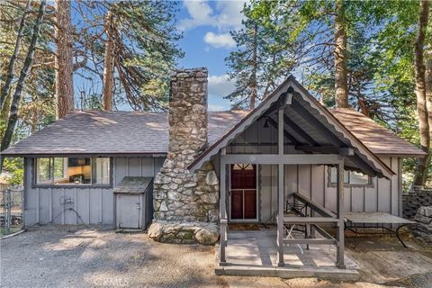 Photo of 21621 Sawpit Canyon Rd, Cedarpines Park, CA 92322 (MLS # IG26045640)