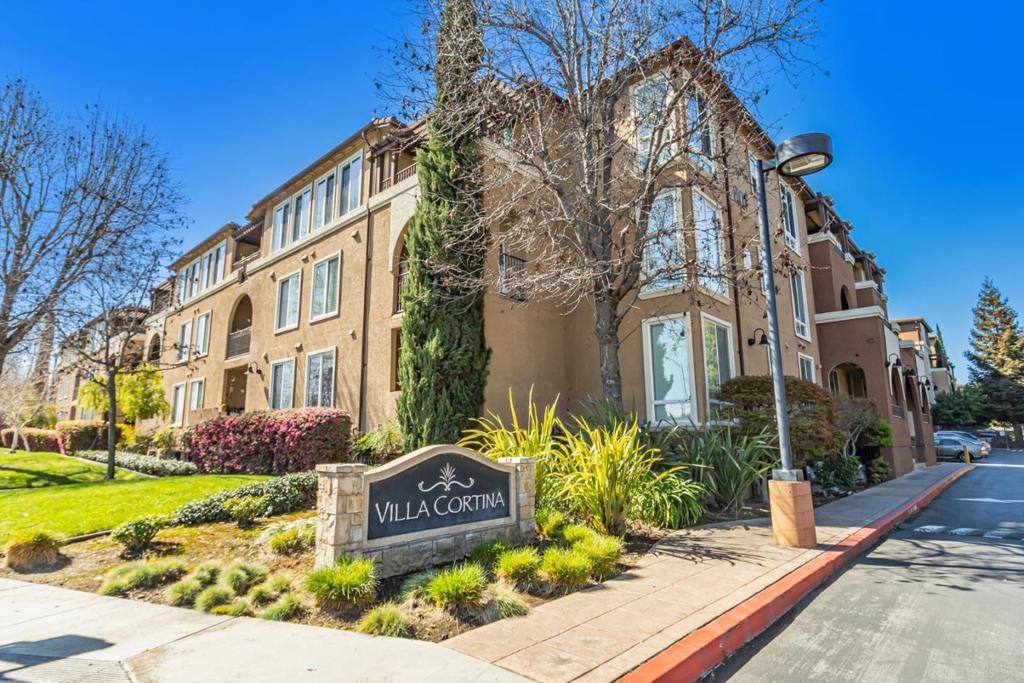 Prepare to fall in love! This freshly painted, move-in ready condo features brand new, beautiful flooring and is located in a secure, gated community just minutes from Santana Row and Valley Fair. Enjoy a spacious and open layout with crown molding, granite countertops, dual-pane windows, and in-unit laundry. The kitchen is equipped with stainless steel appliances and ample cabinetry, perfect for everyday living and entertaining. Relax in the generous living and dining areas, retreat to a large walk-in closet, and take advantage of the private balcony with extra storage. Assigned gated parking included. Community amenities offer resort-style living with a pool, spa, gym, clubhouse, BBQ area, dog park, and playgroundjust bring your suitcase!