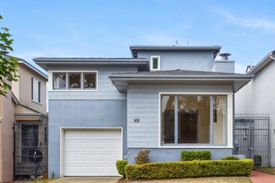Charming Westlake home in desirable #1 Olympic neighborhood evokes a sense of timeless and classic mid-century design. Beautiful hardwood floors add warmth and elegance highlighting classic details throughout that have stood the test of time. The traditional fireplace in the living room serves as a central point of comfort and warmth for family and friends to gather. Build lasting memories in the hub of the home in the versatile entertainment area that functions as an eating area, hobby or play area, entertain guests, or relax by the wood burning stove at the end of a long day. The upstairs bedrooms are bright and spacious with hardwood floors and refreshed with new lighting and paint. Retreat to the spacious primary bedroom which includes enough space for a sitting area or writing desk, and where the large picture window highlights a view to the west of the ocean and golf course.  Versatile bonus room in the garage can be used for an office, hobbies, or man cave.  Relax or BBQ in the fenced backyard with patio area for play, or plant a garden. Easy access to the SF airport, Bart, coastal hiking, golf, recreation, eateries, and minutes to Westlake Shopping Center.  Don't miss your opportunity to own this charming Doelger built home.