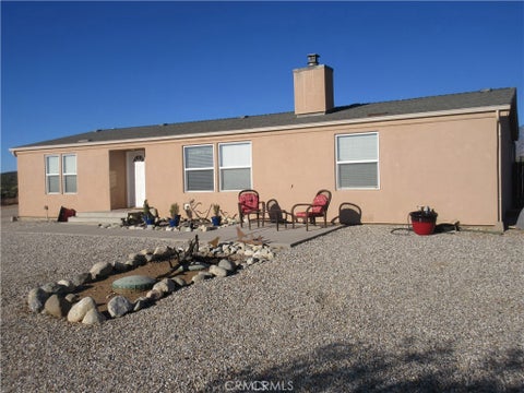 Photo of 7700 Ranchero RD, Phelan, CA 92371 (MLS # IV26182408)