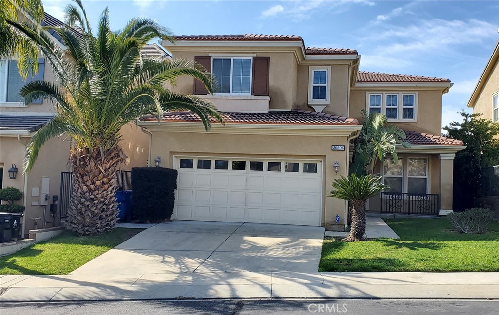 BEAUTIFUL PORTER RANCH HOME IN A GATED COMMUNITY – This beautiful 3 Bedroom 3 Bathroom plus upstairs loft/bonus room area with 2,449 Sq. Ft., built in 2006 in the highly desire guard-gated SORRENTO COMMUNITY. Kitchen with large center island and built in appliances which opens up to large living/family room with fireplace. Former Dining Room. Ground floor polish concrete and second floor carpet and tile. Large Master Suite with large walk-in closet, double sink, separate tub and shower. Laundry Room upstairs with washer/dryer hookups. Double Pane Windows. The garage will fit 3 cars. This community has 2 community pools/spas and playgrounds. Close to retail shopping centers, movie theater and restaurants which includes Whole Foods, Ralphs, Walmart Super Center, Best Buy, AMC Theater, and Nordstrom Rack. Easy access to the 118 Freeway. Sorry No Pets Allowed. This is a No Smoking House.