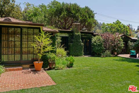 Photo of 1821 Mandeville Canyon Road, Los Angeles, CA 90049 (MLS # 26866245)
