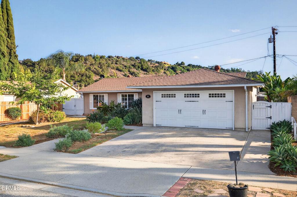 This beautifully updated 3-bedroom, 2-bath home offers 1,257 square feet of comfortable, move-in ready living space--and feels even more expansive thanks to the wraparound covered patio that seamlessly blends indoor and outdoor living. If you love to cook, you'll enjoy the spacious kitchen with updated cabinetry, sleek countertops, and stainless steel appliances. For those who love to entertain, sliding glass doors off both the kitchen and living room open directly to the patio, creating the perfect flow for gatherings or quiet evenings outside. The primary bedroom is oversized, offering a serene retreat with a beautifully remodeled bathroom and walk-in shower. Set on a 7,840 sq ft lot, there's space to garden, relax, and even park your RV or boat along the large gated side yard. This single-level home is located in the desirable Mira Monte neighborhood, just moments from the Ojai Valley Trail and surrounded by walkable streets with sidewalks perfect for evening strolls. For eligible buyers, an assumable FHA loan with a low interest rate may be available--an incredible opportunity in today's market. This is a home designed to simplify life--so you can enjoy all that the Ojai Valley has to offer.