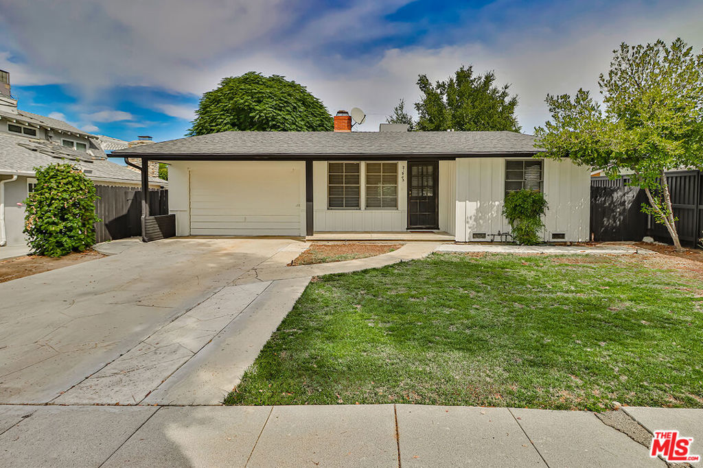 Beautifully remodeled 3-bedroom, 2-bathroom home nestled on a peaceful, tree-lined street south of Ventura Blvd in Woodland Hills. Featuring an open floor plan and a huge backyard, this home is perfect for modern living and entertaining guests. The interior boasts luxury vinyl flooring, newer paint, recessed lighting throughout, and newer kitchen cabinets with Quartz countertops. The living room, complete with a contemporary fireplace, seamlessly flows into the dining area, kitchen and extends to the expansive backyard, offering the perfect space for gatherings and relaxation.This home also offers a newer roof, central AC/heat, and appliances, including a washer and dryer. The garage has been thoughtfully converted into a stylish media room, adding extra living space for entertainment or relaxation. Conveniently located close to schools, parks, shopping and dining, Topanga Canyon Blvd and easy access to 101 fwy. Schedule your showing appointment asap, this one will go fast!