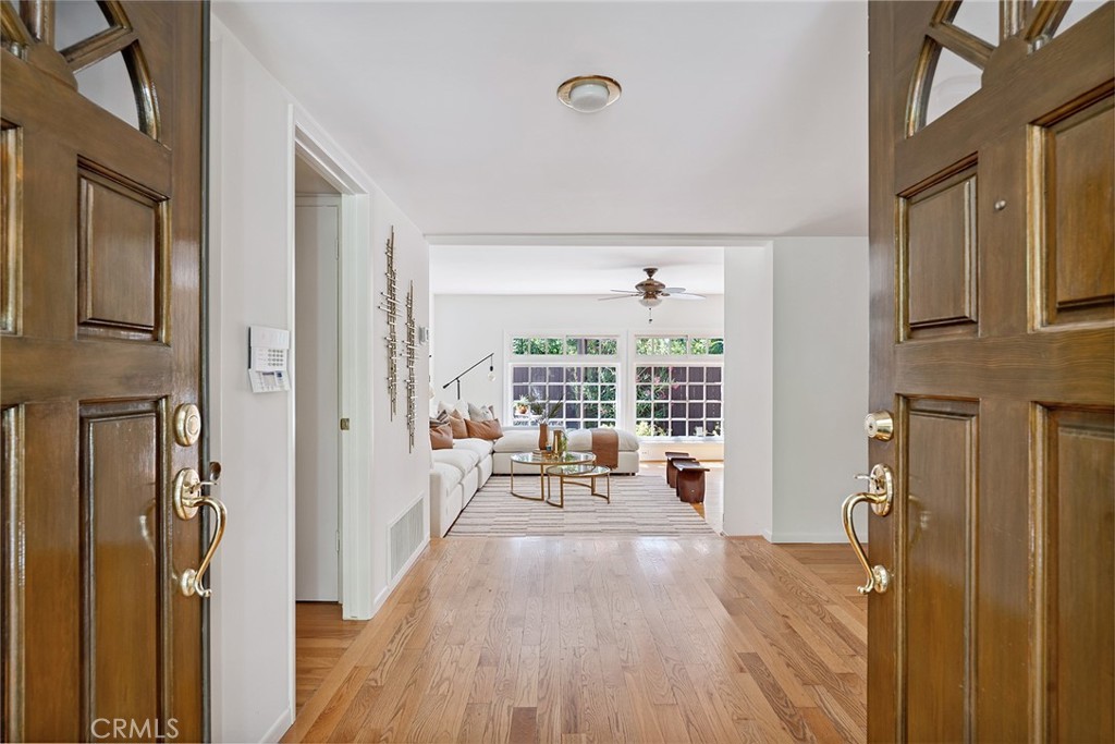 Nestled at the end of a peaceful cul-de-sac in the Bird Streets (Park Moderne) of Calabasas, this beautifully maintained 4-bedroom, 3-bathroom home offers a perfect blend of comfort, functionality, and tranquility. Filled with natural light and designed with a thoughtful layout, this residence is ideal for both everyday living and entertaining. The open and thoughtfully designed floor plan includes a privately located guest bedroom, ideal for visitors, in-laws, gym or a dedicated home office. The primary suite offers a peaceful retreat with a large picture window overlooking the serene backyard. It features an en-suite bathroom with dual sinks and a walk-in closet. The bright and airy living space flows seamlessly into the dining and kitchen areas, creating a comfortable and connected atmosphere for everyday living and entertaining. Large windows throughout the home bring the outdoors in, enhancing the peaceful ambiance. Step outside into an expansive backyard oasis surrounded by beautiful lush landscaping. Enjoy a large side yard, perfect for play or gardening, and a separate pool and spa area conveniently tucked away for both relaxation and entertaining. Located within the award-winning Las Virgenes Unified School District and close to several top-rated private schools, this home also offers unbeatable access to renowned restaurants, high-end shopping, scenic hiking trails, and just a short drive to the stunning beaches of Malibu.