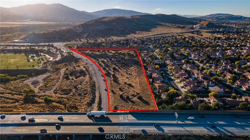 THIS IS A RARE OPPORTUNITY. Over 10 Acres Zoned COMMERCIAL in the city of Palmdale AND RIGHT ON THE FREEWAY! Two Separate Contiguous Parcels being sold together. Zoned RC, Regional Commercial and Suitable for Retail, Office, Hotel, Mini-Storage, Gas Station, Car Wash and more. Buyer to confirm with the City of Palmdale to confirm what uses will be allowed. Not only Adjacent to AV Freeway but also to Residential Development to the north and west. There are Block walls on two sides. All Utilities available. Close to Major Shopping Outlets and Community Shopping Centers, the Palmdale Business Park and the Palmdale Regional Hospital. Lots of development options. Don't miss this rare opportunity. APNs 3004-015-042 and 043.