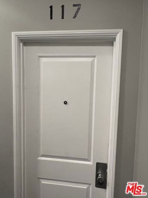 Photo of 117 E 45th Street, Los Angeles, CA 90037 (MLS # 25624637)