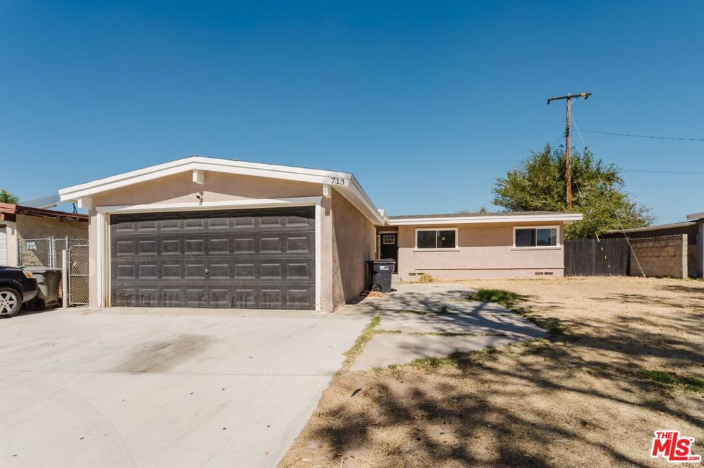 Photo of 713 W Avenue H10, Lancaster, CA 93534 (MLS # 26993271)