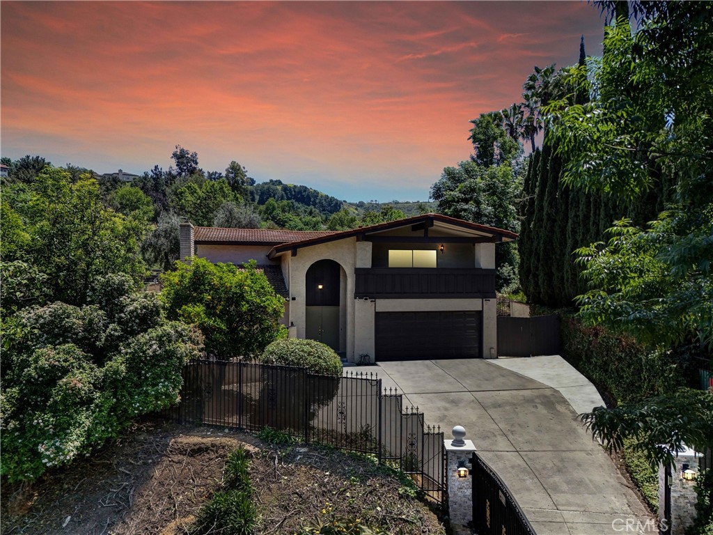 Nestled in the prestigious South Hills neighborhood of West Covina, 1467 S Montezuma Way is a beautifully maintained 4-bedroom, 3-bathroom home offering 2,657 square feet of living space on an expansive 19,960-square-foot lot. Built in 1976, this two-story residence features a bright and open floor plan with high ceilings, a gourmet kitchen with granite countertops and stainless steel appliances, and a spacious master suite with a walk-in closet and private balcony. The backyard is an entertainer’s dream with a sparkling pool and stunning mountain views. Conveniently located near South Hills Country Club, top-rated schools, shopping, and major freeways, this home offers the perfect balance of luxury, comfort, and accessibility.