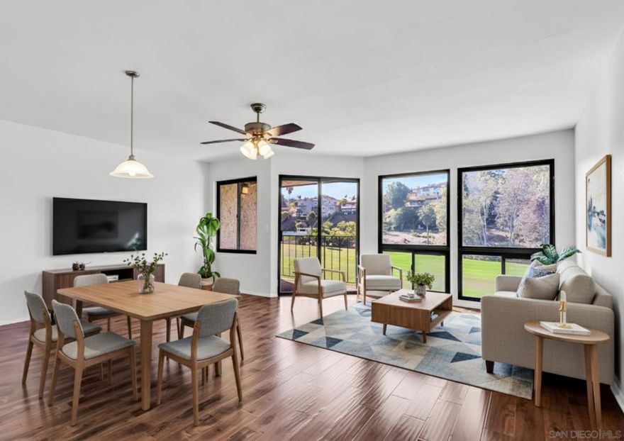 Welcome to 2507 Navarra Dr, Unit 202! This spacious 1,109 sq ft one-bedroom, one-bath condo can easily be converted into a two-bedroom—offering huge value at a fraction of the cost of a comparable 2-bedroom in the complex. Enjoy golf course and greenbelt views, a bright open floor plan, a modern kitchen with stainless steel appliances and black countertops, wood-style flooring, a private balcony, and community amenities including a pool, spa, and covered parking.  While the unit does not include in-unit laundry, residents have convenient access to a shared laundry room with two washers and two dryers, located just downstairs near the unit’s covered garage parking space. Community amenities include a sparkling pool and spa within a serene, well-maintained setting. All of this is just minutes from La Costa Resort, beaches, shopping, and dining—perfect for experiencing the best of coastal Carlsbad living.