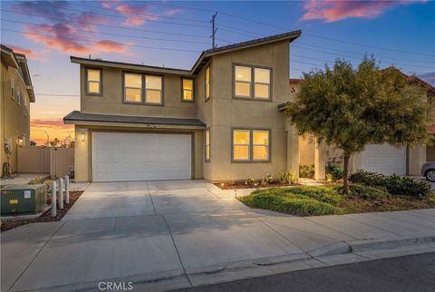 Photo of 1176 Woodbury Ln, Mentone, CA 92359 (MLS # CV26046724)