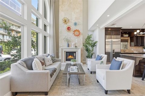 Photo of 5433 E The Toledo, Long Beach, CA 90803 (MLS # PV25268087)