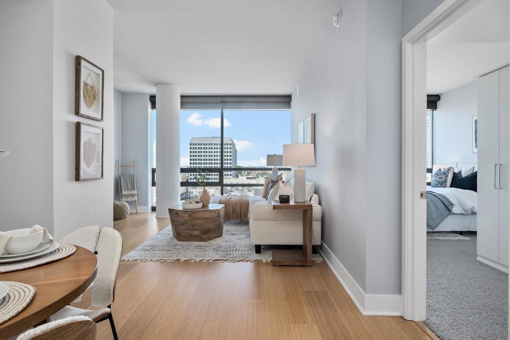 Luxury High Rise Living. The most sought-after location in downtown SJ! THE 88 offers an exclusive lifestyle where convenience, sophistication & 5 star amenities come together to create a living experience like no other. A spacious open floor plan w/floor to ceiling windows & sweeping skyline views. Modern finishes & tasteful upgrades, designer LED lighting, bamboo wood flrs, granite counters S/S BOCSH appliances, automatic Hunter Douglas shades, full size w/d. Sun drenched deck, heated pool, hot tub, bbq area & landscaped courtyard provide resort-like outdoor living always at your leisure. Free wifi throughout all community spaces. Private event area featuring a gourmet kitchen, gas fireplace, media wall and comfortable seating arrangements. 24 hour attended guest lobby & door man. Observation rooftop deck to enjoy evening drinks, watch planes on their landing approach, or take in Silicon Valley views. Modern fitness facility and private billiards, dry cleaner insure you are always on top of your game. Walk to great restaurants, clubs & urban delights. Easy access to hwys, transit, quick work commutes, short uber to SJC. The world is at your fingertips. HOAs cover everything but elect & internet. Elevate your life at The 88 Live the life you deserve, make this yours, today.