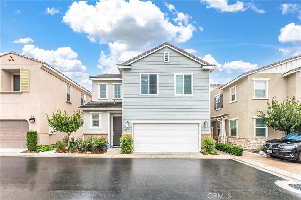 Discover stylish, modern living in this beautifully maintained 3-bedroom, 2.5-bath home nestled in the highly desirable Westridge at Sycamore Hills community. Offering 1,621 square feet of thoughtfully designed living space, this home perfectly balances comfort, function, and convenience. The open-concept main floor welcomes you with a bright, airy living area that seamlessly connects to the dining space and a contemporary kitchen—ideal for both everyday living and effortless entertaining. A convenient downstairs powder room and ample storage keep life organized and guest-ready. Upstairs, retreat to the spacious primary suite, where you'll find abundant natural light, a luxurious en-suite bathroom with dual vanities, a soaking tub, a separate shower with built-in bench, and a generous walk-in closet. Two additional bedrooms, a full bath, a large linen closet, and a dedicated laundry area complete the upper level.located on a quiet street just minutes from shopping, dining, and freeway access, this home also grants access to sought-after community amenities including a pool, barbecue area, and playground. Move-in ready and meticulously cared for, this home offers the perfect blend of comfort and convenience—just waiting for you to make it your own.