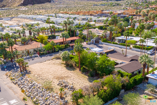 Originally owned by the Knott's Family of Knott's Berry Farm, this lot is located in the beautiful and highly desired Tennis Club. Offering over 13,000 square feet, amazing mountain views and close to downtown, shopping, dining and entertainment. If you are looking to build your own home or hold on to for investment this could be the lot for you.