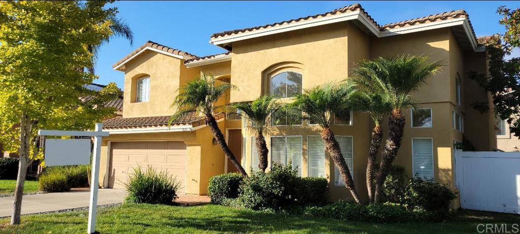 The LARGEST floorplan in the desirable gated community of Versailles. Welcome to this beautiful home which feels like RESORT style living with FULL BED and BATH downstairs and amazing location directly across the street from the pool/spa and open green-belt area/park so you get the convenience of these great amenities within steps...You will be greeted with vaulted ceilings, lots of windows so always light and bright. Luxury vinyl flooring in this living room w/dining area and elegant staircase. Large open kitchen w/white cabinets & lots of counter space, WALK-IN pantry and bay seating area for additional dining. Kitchen flows into the spacious family room with a cozy fireplace overlooking your backyard. Large primary suite with separate tub & shower with large size walk-in closet. All bedrooms are generous in size. This home boasts vinyl fencing and Saltillo style tile in the backyard for EZ maintenance. Walking distance to elementary, middle and high schools. This wonderful home is close to shops, restaurants, parks, breweries, and the Frontwave Arena home to the San Diego Clippers. Just a quick (4 mile) drive to downtown Oceanside with resorts, restaurants, Harbor, Oceanside Pier and SANDY BEACHES.
