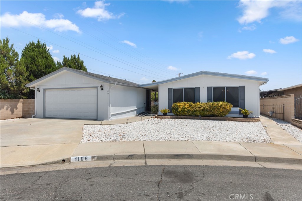 Welcome to this well-maintained 2-bedroom, 2-bath manufactured home on a permanent foundation, perfectly situated in one of Hemet's most active 55+ communities. Features solar with an EV charging station that will be paid off at close of escrow. New furnace, AC, and hot water heater. The home also features accessibility features, making it perfect for anyone with those needs.
Built in 1978, this inviting residence offers comfortable single-level living with the bonus of a spacious two-car garage and larger lot, a rare find in the neighborhood.
Inside, you'll find a bright, functional floor plan designed for ease of living. The living and dining spaces flow effortlessly, while the kitchen offers plenty of storage and workspace for everyday meals or entertaining friends. Both bedrooms are generously sized, with the primary suite featuring its own private bath.
Step outside and enjoy the community's resort-style amenities, including a sparkling pool, clubhouse, and a full calendar of social activities to keep you as busy as you'd like. Whether you're looking to relax in the sun, join neighbors for game nights, or explore the areas nearby shopping, dining, and golf, this location has it all.