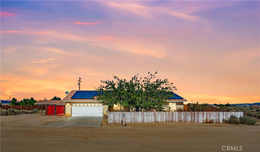 Welcome to this Beautiful Single-Story Custom Home Offering Four Bedrooms and Two Bathrooms with a Bright and Inviting Open Floor Plan. The Spacious Family Room Flows Seamlessly Into a Large Kitchen Featuring a Breakfast Bar and an Abundance of Cabinets for Storage, Making it Ideal for Both Everyday Living and Entertaining. Fresh New Carpet adds Comfort Throughout, while the Oversized Master Suite Provides a True Retreat with Dual Sinks, a Separate Shower, and a Relaxing Garden Tub. Three Additional Bedrooms and a Full Guest Bathroom Ensure Plenty of Space for Family and Guests. The Home also Includes an Attached Two-Car Garage, a Solar System, RV Access, and a Large Clean-Slate Backyard Ready for Your Dream Landscaping or Pool. Perfect for a First-Time Buyer, this Home Combines Comfort, Functionality, and Endless Potential.