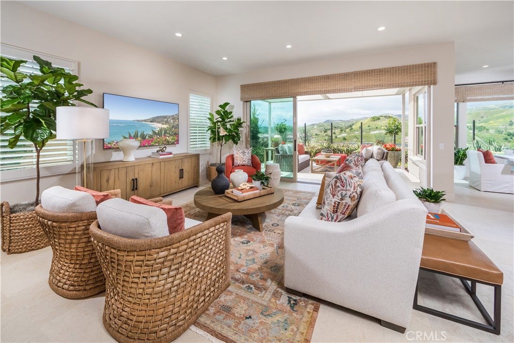Photo of 107 Oakstone, Irvine, CA 92618 (MLS # OC26154477)