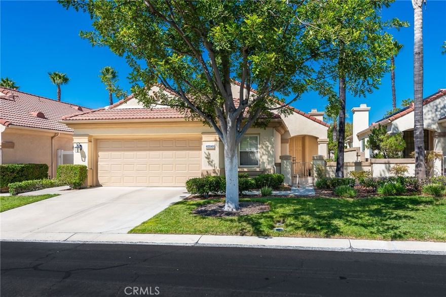 Welcome to this stunning single-story home, perfectly nestled in a beautiful, established neighborhood "The Colony" Boasting a fantastic blend of comfortable indoor living and sun-drenched outdoor enjoyment, this property is ideal for those seeking modern convenience in a serene setting. Step inside to an open floor plan where the main living areas flow seamlessly. The heart of the home is the updated kitchen, featuring, extensive white cabinetry for incredible storage, sleek stainless-steel appliances, quartz countertops, a modern backsplash, and a large center island with seating. Relax in the main living room beside a cozy fireplace, or unwind in the adjacent carpeted den, perfect for movie nights. High ceilings and ceiling fans enhance the bright, airy atmosphere throughout. The spacious Primary Suite is a true retreat, offering plush carpeting, an en-suite bath, and direct sliding door access to the private outdoor space. Outside, you'll find a large, shaded pergola-covered patio an ideal setting for al fresco dining, entertaining guests, or simply enjoying the California sunshine. Other features include new blinds in the bedrooms, updated bathrooms with new sinks, counter tops, and modern light fixtures shutters in living and family room, low maintenance landscape with newer sprinklers.