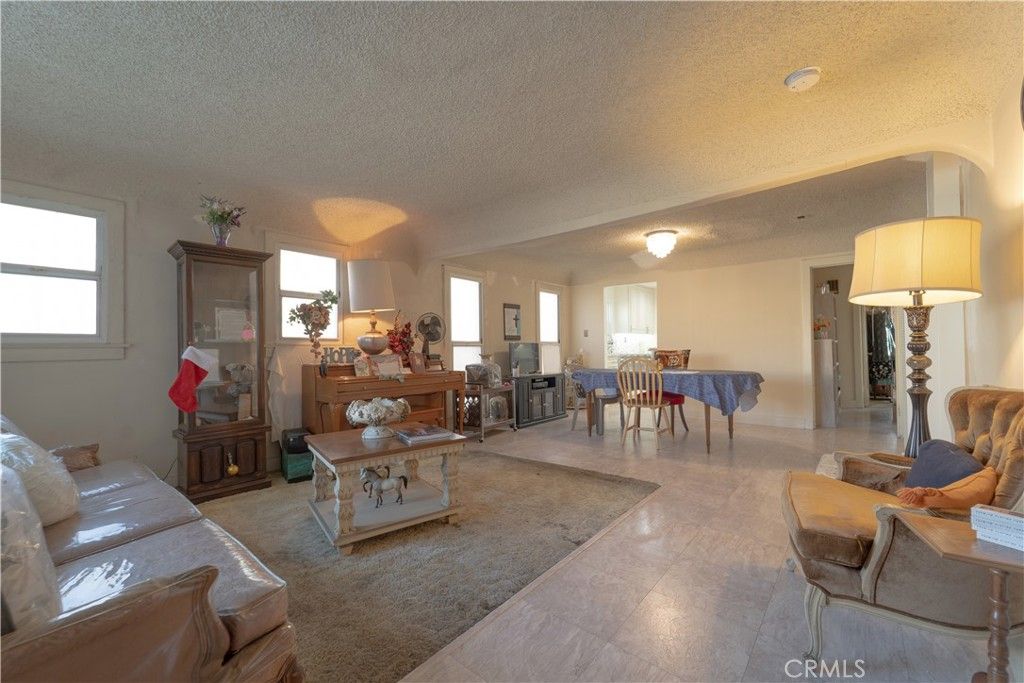 Photo of 1706 W 65th Place, Los Angeles, CA 90047 (MLS # DW25266822)