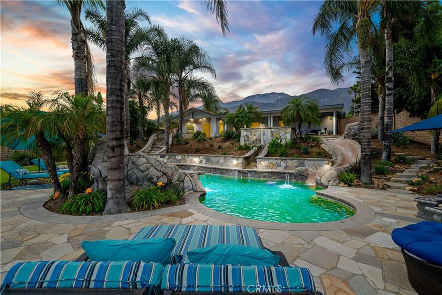 ***Welcome to Paradise*** Don't miss out on this incredible opportunity to own this gorgeous single story salt water POOL/SPA home with VIEWS,VIEWS,VIEWS in a highly desirable location!! Situated on a great sized half acre corner lot and also on a cul-de-sac, this home is amazing for entertaining and more!! As you approach the residence, enjoy the attached 3 car garage, tranquil fountain near the entry way, and mature landscaping. Also enjoy the tasteful exterior and interior paint schemes. Upon entry, enjoy the living room, extra dining space, beautiful exposed wood ceilings with recessed lighting, gorgeous open kitchen with plenty of cabinet and counter space as well as a dishwasher, trash compactor, range, built in microwave, the list goes on!! The family room features a warm and inviting fireplace, nice vaulted ceilings, ceiling fan, large sliding glass door that showcases the views, and a bar area. The master bedroom also features a private sliding glass door and access to the patio area, as well as a gorgeous en suite master bathroom with custom cabinets and shower. Other notable features include the custom outdoor cook station with bar, sink, natural gas BBQ, refrigerator and storage, gas fire ring, tile roof, Tesla 230 volt charger with dedicated circuit, custom wrought iron pergola, whole house fan, pool safety fence included, close to bridle trails, so many things!! The back yard is AMAZING!! Enjoy entertaining with the covered patio, large raised spa, amazing pool with slide and waterfall, rear access for vehicles, RV, toys and more, garden area, built in BBQ area, and breathtaking views, you have to see in person!! Located close to freeways, shopping and entertainments, parks, desirable schools, and SO MUCH MORE!! Act now, before it's too late!!