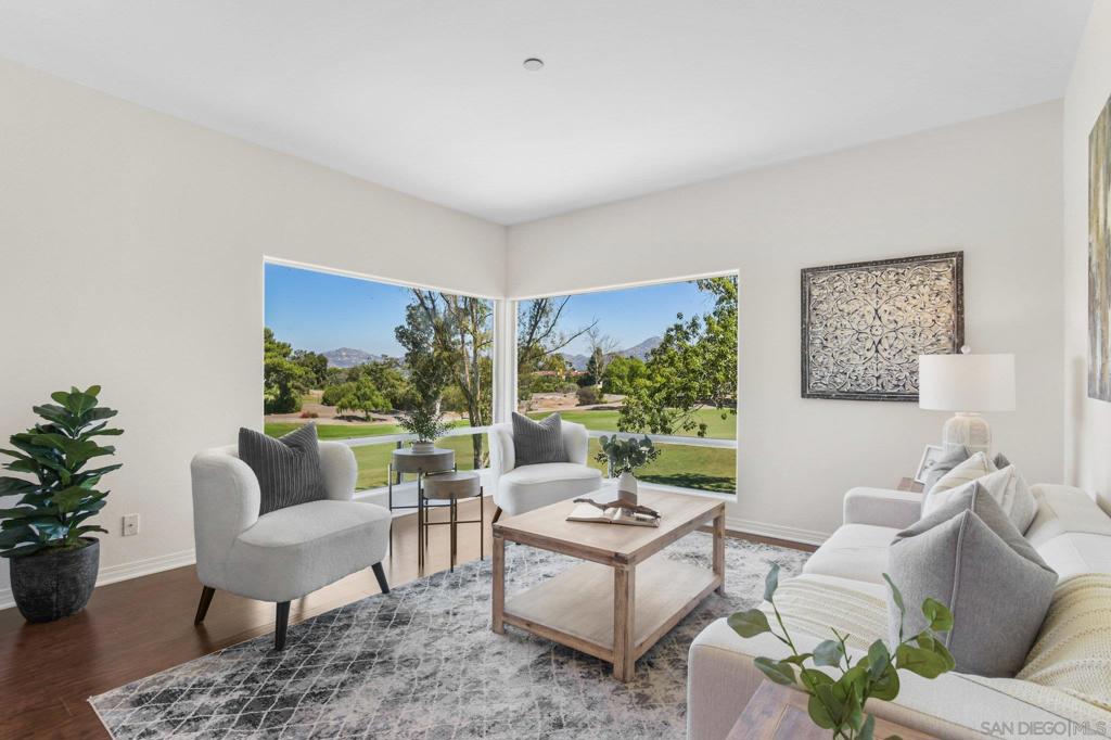 Gorgeous golf course views surround this upgraded corner unit in the gated Masters Hill community of Rancho Bernardo. This light and bright single-level condo offers two spacious bedrooms and two full baths, with an open floorplan that captures natural light and scenic vistas from most rooms. Interior highlights include central air conditioning, granite kitchen countertops, fresh paint throughout, and a cozy fireplace that adds warmth and charm to the living space. The primary suite features a remodeled en-suite bath and a generous walk-in closet. Conveniently located near the building entrance, the unit includes two dedicated covered parking spaces with upper storage units. Recent building upgrades include newly installed elevators and ongoing roof replacement. HOA dues cover most utilities—water, gas, internet, cable, trash, and exterior maintenance—providing exceptional value and ease of ownership. Residents enjoy access to three community pools and the Bernardo Heights Community Center, which offers an Olympic-sized pool, wading pool, jacuzzi, locker rooms, fitness center, BBQ area, tennis and pickleball courts, basketball hoops, and a variety of recreational amenities. Situated in the heart of Rancho Bernardo, this move-in-ready home is within walking distance to Rancho Bernardo High School and Bernardo Heights Middle School, and just minutes from parks, shopping, dining, and freeway access. A rare opportunity to enjoy low-maintenance living in one of San Diego’s most desirable gated communities.