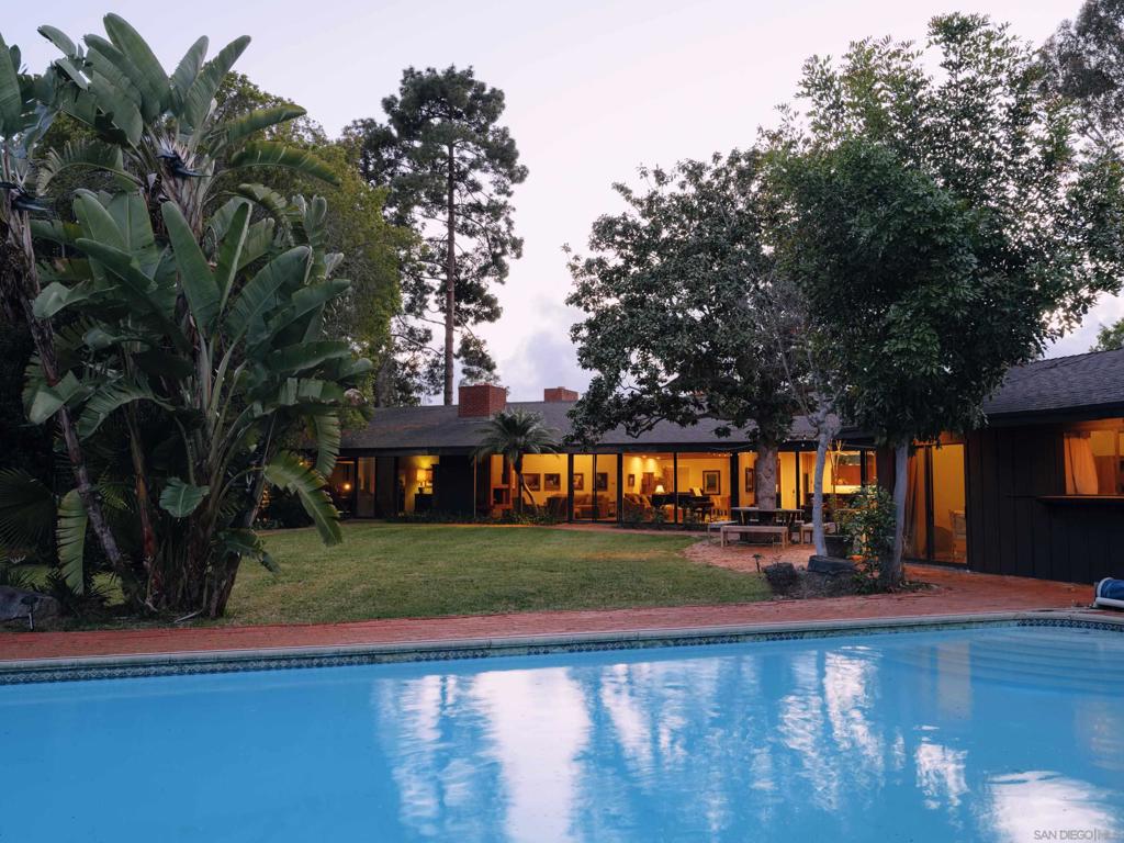 Mid-Century modern architect Richard Neutra’s Van Sicklen Residence is on the market for the first time in 50 years. One of only four residential designs by Neutra in San Diego County, the home retains original detailing but has been expanded over the decades, offering an array of possibilities for its next caretaker. Following the addition of a swimming pool, a ~900 sqft 1-bed, 1-bath cabana, the original home was expanded in 1975-6 by Gerald Jerome. A third 4-bed, 4-bath structure was added on to the home via a breezeway around 1990. Resting amidst 1.3 acres the opportunities are varied - from restorative work on the Neutra design to further expansion and remodeling of the multifamily-ready site to fully capture the landscape in this perfect Rancho Santa Fe Covenant setting a short walk to the Village, Roger Rowe School, golf course, tennis courts, and clubhouse.