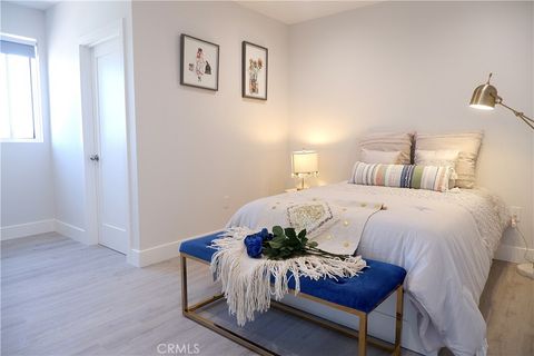 Photo of 1410 W 37th Place, Los Angeles, CA 90018 (MLS # SB26113459)