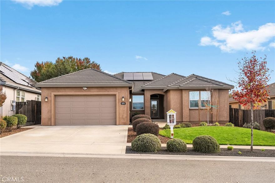 Beautifully updated 4 bedroom, 3 bathroom 2,341 SF home with owned solar and modern kitchen. The stylish interior features high ceilings creating an open, airy feel. All 4 bedrooms are spacious and have full sized closets. The Primary suite is situated in the back corner of the home providing privacy and includes a massive dual sink vanity and oversized walk in closet. Recessed lighting and luxury vinyl plank flooring in common areas. Full sized indoor laundry room with sink and extra cabinetry. The 44 panel, 10.73 kW owned solar system includes 2 battery back up units. The tastefully landscaped back yard is equipped with a Jacuzzi and Covana Oasis electronic cover which lifts with a push of a button, has sun shades and colorful lights! If you enjoy a home gym, the two car garage is the perfect spot because there is a mini split air conditioner/heater already installed. The tile roof is built to last on this 2016 built home. Near Meriam Park and shopping. Get anywhere in town quickly with close access to Bruce Rd, Skyway Hwy 32 and Hwy 99.