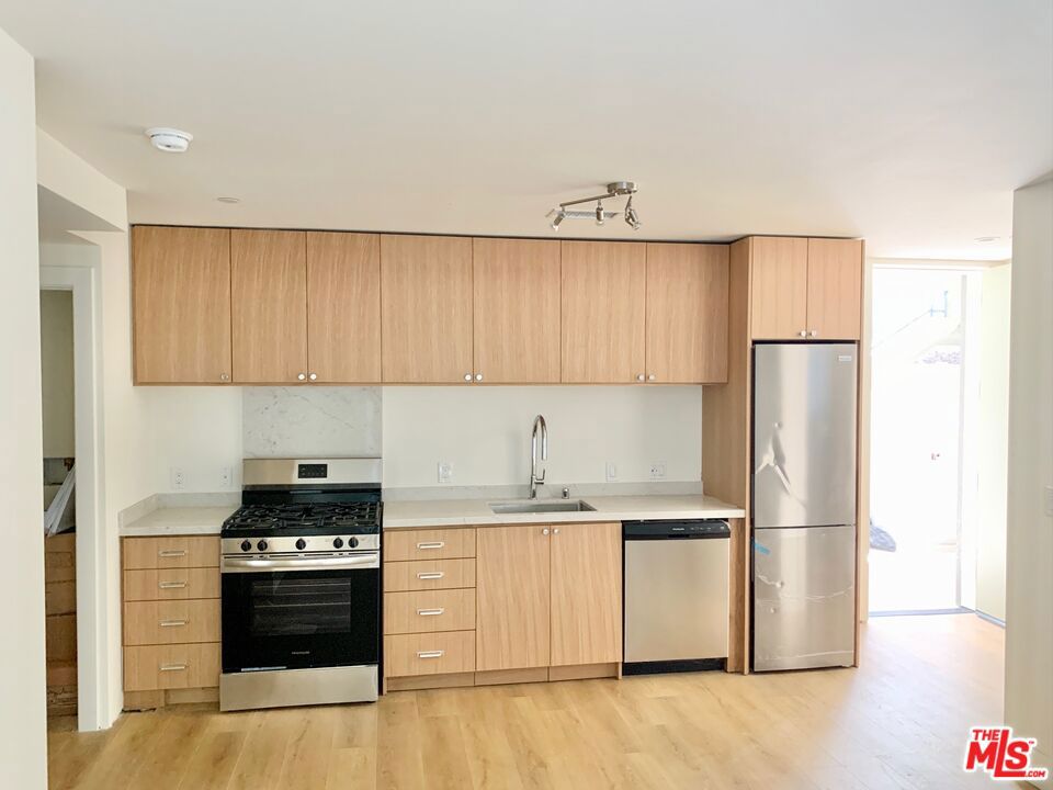 Discover elevated urban living in Westwood's newest modern apartment community. Perfectly tailored for professionals, students, and families, this brand-new construction 16 unit complex blends modern style with comfort and functionality. Be the first resident! Apartment 102 is middle unit and features a 2 bedroom/2 bathroom open concept layout. It's one of the two affordable only units. The apartment comes equipped with new stainless steel appliances, in-unit laundry, and central air and heat. Enjoy the ease of secure underground parking and working remotely from the rooftop deck. 1822 Overland is centrally located to major employment, freeways, and points of interest alike. Residents will enjoy the short 1.5 mile or less proximity to the UCLA campus, Century City Mall, the 405 freeway, and the upcoming Metro Purple Line extension stops at Wilshire/Gayley and Constellation/Avenue of the Stars. Don't miss this opportunity your new luxury lifestyle awaits!