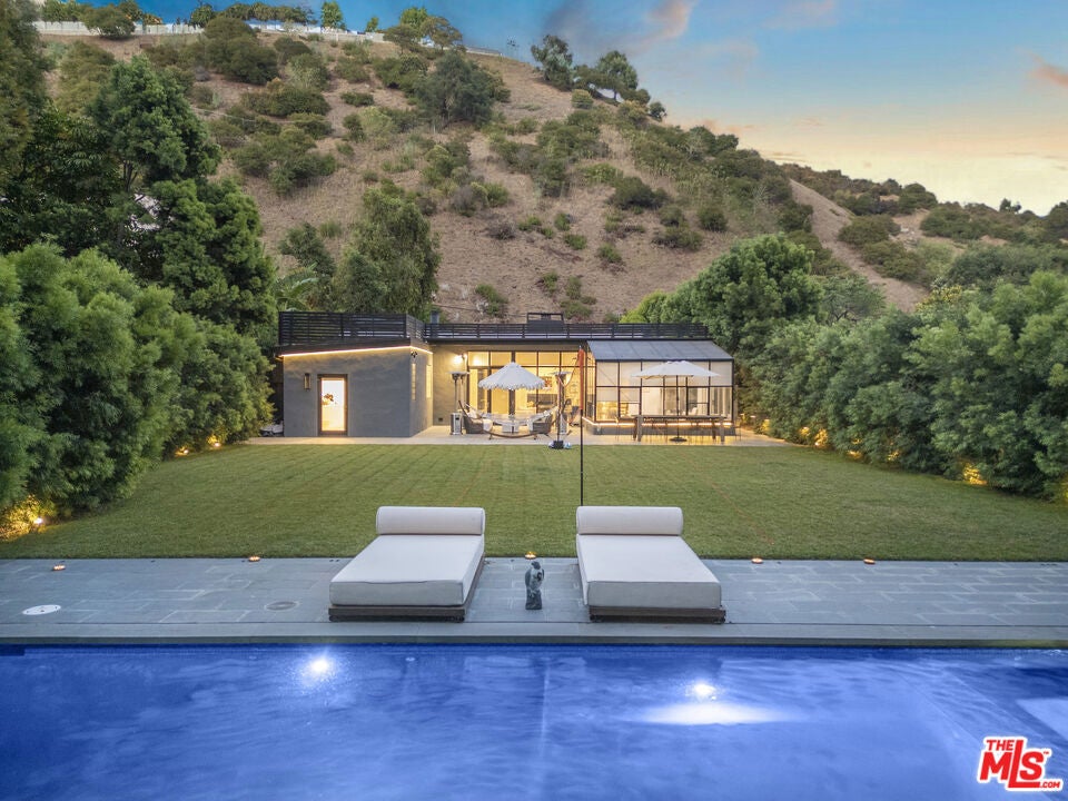 Photo of 1833 Franklin Canyon Drive, Beverly Hills, CA 90210 (MLS # 26101624)