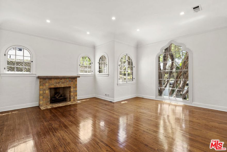 This charming 3bd/2ba home is approximately 1,450 sq.ft., updated, gated, and private with manicured gardens surrounding the home. Situated on a quiet dead-end street, in the center of the city (the corners of WeHo, Beverly Hills and Los Angeles), featuring central heating/ac, spacious living room, dining room with gleaming hardwood floors, elegant fireplace and a large private backyard & side patio. The gourmet kitchen boasts, generous counter space, stainless steel appliances, and plenty storage. Enjoy peace of mind with the luxury of a programmable entry intercom system, wide driveway and the rarity of a 2-car garage in West Hollywood West. Near-by cedars sinai medical center and the best of West Hollywood's shopping, restaurants, sidewalk cafes and entertainment!