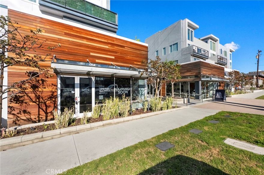 Experience elevated coastal living in this modern Redondo Beach community, where luxury meets convenience. This condo at One South is thoughtfully designed to maximize space and natural light. The living room features soaring 18-foot ceilings and expansive west-facing windows. The gourmet kitchen includes custom fixtures, Bosch appliances, and generous countertops with bar seating—perfect for cooking or entertaining.

The primary suite offers an en-suite bathroom and a spacious walk-in closet, creating a private retreat. A versatile upstairs loft adds flexibility and can serve as a third bedroom, office, gym, or study.

One of this home’s standout features is the approximately 600 sq ft rooftop deck, showcasing stunning ocean sunset views to the west. It’s an ideal setting for relaxation or hosting gatherings with the Pacific Ocean as your backdrop.

Additional conveniences include two assigned parking spaces and a private, secure storage room.

The location places residents close to award-winning schools, including nearby Tulita Elementary.