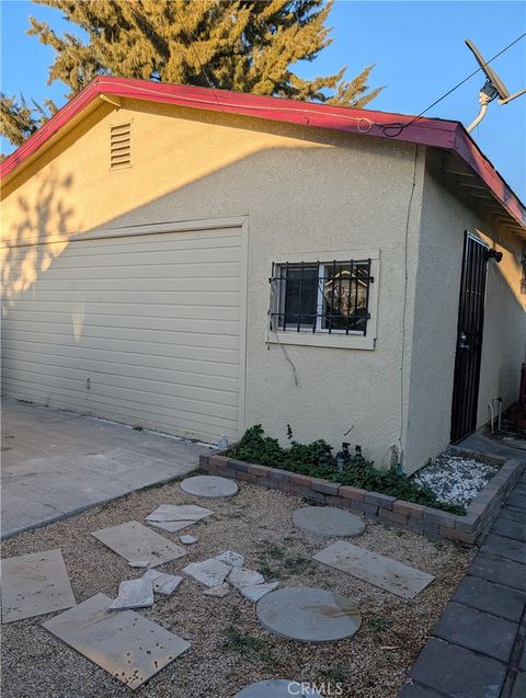Photo of 11212 Grape Street, Los Angeles, CA 90059 (MLS # PW25240653)