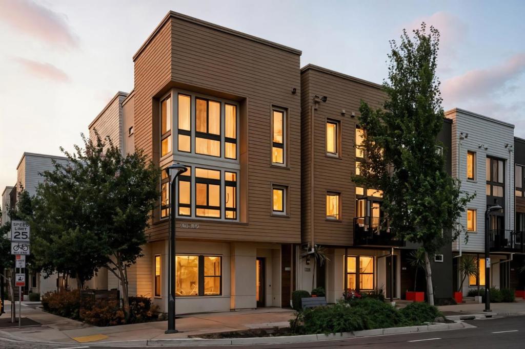 Modern elegance meets urban convenience in this stunning luxury home located in the very heart of downtown Fremont. Designed for those who appreciate elevated living, this residence boasts premium finishes and an open, light-filled layout that effortlessly blends comfort and sophistication. Inside, you're welcomed by wide-plank hardwood flooring, custom cabinetry, and expansive windows that bathe the space in natural light. The chefs kitchen is equipped with high-end stainless steel appliances, quartz countertops, and a generous island thats perfect for hosting or unwinding at the end of the day. Every detail has been considered, including the impeccably finished private garage with commercial-grade epoxy flooring, offering both durability and a polished aesthetic that reflects the quality throughout the home. Step outside and enjoy unbeatable access to Central Park, Lake Elizabeth, and a vibrant mix of dining, retail, and entertainment options, all just moments away. During the summer months, youll love the lively Friday nights at Fremont Street Eats, a beloved community event featuring gourmet food trucks, live music, and an unbeatable small-town vibe. Major commuting routes nearby, including BART, I-880, and I-680, making this the ideal hub for Bay Area professionals.