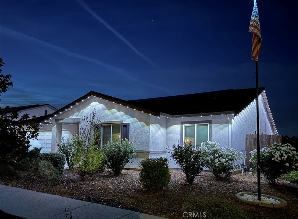 This adorable 4 bedroom with owned solar-newer build sits on a corner lot with easy-to-maintain landscaping. Just minutes from the Afterbay and Lake Oroville, you’ll enjoy endless opportunities for outdoor recreation including boating, fishing, and hiking. Step inside to find a bright and welcoming interior featuring luxury vinyl plank flooring throughout. The open-concept great room offers a spacious living area that flows seamlessly into the kitchen, complete with a large island, soft-close white cabinets, granite countertops, stainless steel appliances, and a pantry. The dining area, with sliding doors to the backyard, is perfect for entertaining or casual meals at home. With three generously sized guest bedrooms and a private primary suite, there’s plenty of room for everyone. The primary suite includes a walk-in closet and an en-suite bathroom with a double-sink vanity and private shower. Additional features include a two-car garage with epoxy flooring. The backyard is ready for your personal touch with a large patio area, storage shed, and space for a grassy play area or garden beds. Come check out this beautiful home and great location!