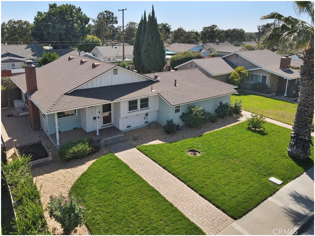 Charming Single-Story Home with Great Curb Appeal!
This cozy 3-bedroom, 1-story home offers inviting warmth and character from the moment you arrive. Set on a wide lot with a beautifully manicured front lawn, lush gardens, and standout curb appeal, this property welcomes you with a lovely front porch—perfect for morning coffee or evening relaxation. Inside, enjoy the comfort of a wood-burning fireplace and a well-designed layout ideal for everyday living. The spacious backyard provides plenty of room for outdoor entertaining, gardening, or play. Convenient garage access from the rear adds to the functionality of this delightful home. Don’t miss your chance to own this gem!