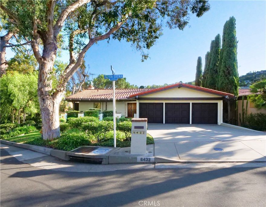 Fabulous Old Spanish in the heart of Miraleste area of Rancho Palos Verdes with Harbor view and spacious backyard.  Walking distance to convenience store, restaurants, L A County Fire Dept and easy access to freeways and Long Beach.  This "one of a kind" Old Spanish has just been refurbished with new paint inside and out, remodeled bathrooms, and features Primary Suite on the main level of the home. As you enter through the spacious outdoor

patiio, you are amazed at the soaring wood beam ceilings and the light pouring in from the outside deck looking out to the L A Harbor.  The main level of the home features formal living room with adjacent Dining room and conveniently located kitchen with informal breakfast eating area.  The Primary suite is located on the main level with attached remodeled bath.  The downstairs level features a huge family room with wet bar and wood burning fireplace plus 3 other bedrooms, one of which has built in cabinets if one choses to use that bedroom as an office/bedroom combination.  You will  love the easy access to shopping, movies, golf courses,restaurants and theatres without leaving the peninsula.  Also walking distance to schools and the new South Bay campus for UCLA.  This home is Special.  Come by this weekend and take a look.