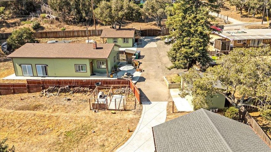 Fantastic Opportunity Two Homes on 1.4 Usable Acres! This is a rare chance to own a beautifully improved dual-home property that's perfect as a primary residence, investment, or multi-generational living. Over the past few years, the owner has made numerous upgrades, making this a truly move-in ready property. The main house features 3 spacious bedrooms and 2 full bathrooms, while the second unit offers 1 bedroom and 1 bathroom ideal for guests, rental income, or extended family. Both homes have been recently renovated with quality finishes and attention to detail. Additional features include a detached two-car garage, a separate art studio, and ample open space for storage, gardening, or future expansion. Situated on a usable 1.4-acre lot, theres plenty of room to create your ideal outdoor lifestyle. Recent improvements include: Newer septic tank, water storage tank, and water pumps.